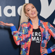 Image for article titled Shock and Awe: Erika Jayne Orders Pizza in Versace Robe